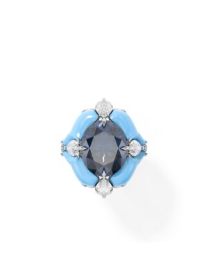 Just Brilliant White gold ring with large oval deep blue lab grown sapphire center stone, surrounded by lab created diamond accents in a sculptural design on white background