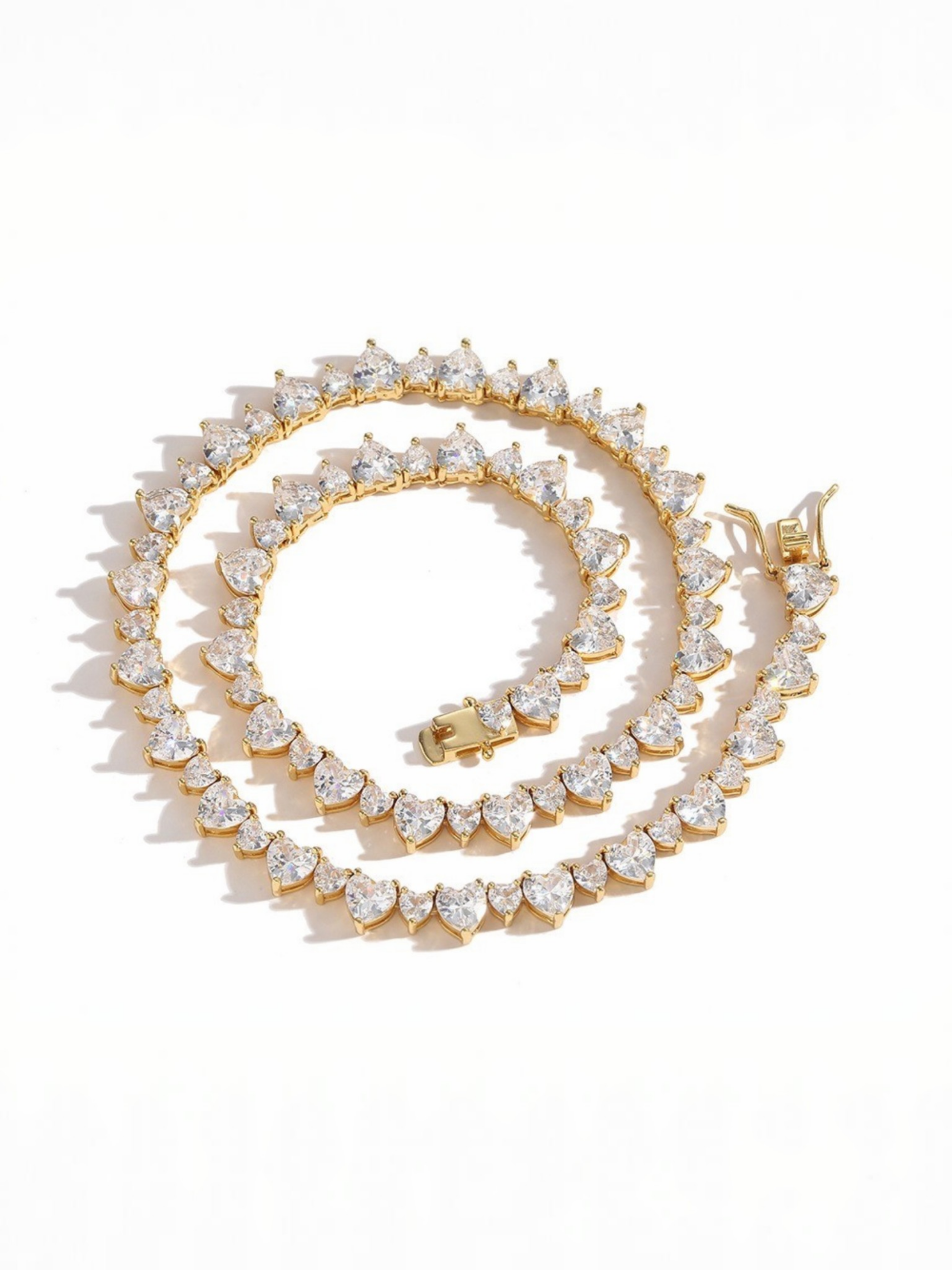 Tania Claire Australia Venus Necklace, gold-plated brass with heart-shaped cubic zirconia stones.