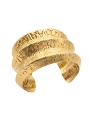 Tania Claire Australia Terra Script Cuff, a gold-tone adjustable cuff with a textured, layered sculptural band design.