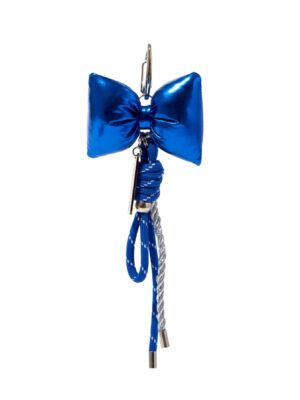 Cobalt-blue Seoul Bag Charm with ribbon bow, braided cord, and crystal bead detail on white background