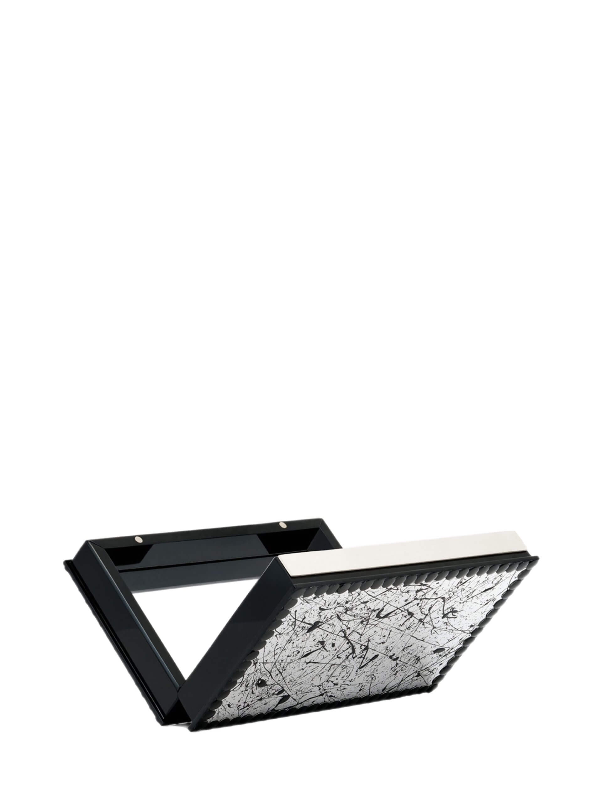 Handmade mirrored plexiglass Rebel clutch with black paint splashes, studded frame, and engraved silver-plated top border