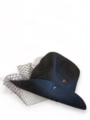 Rosa Isela hat “Don’t be like the rest of ‘em darling”