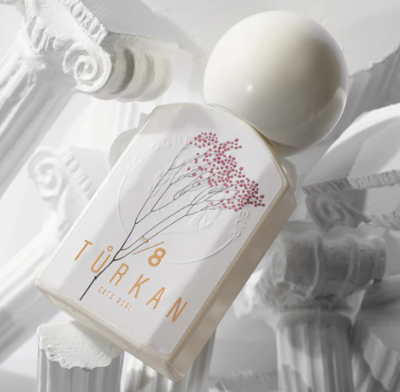 Türkan Fragrances No. 8, a luxurious white perfume bottle, available exclusively at Flying Solo. Discover unique niche perfume brands.